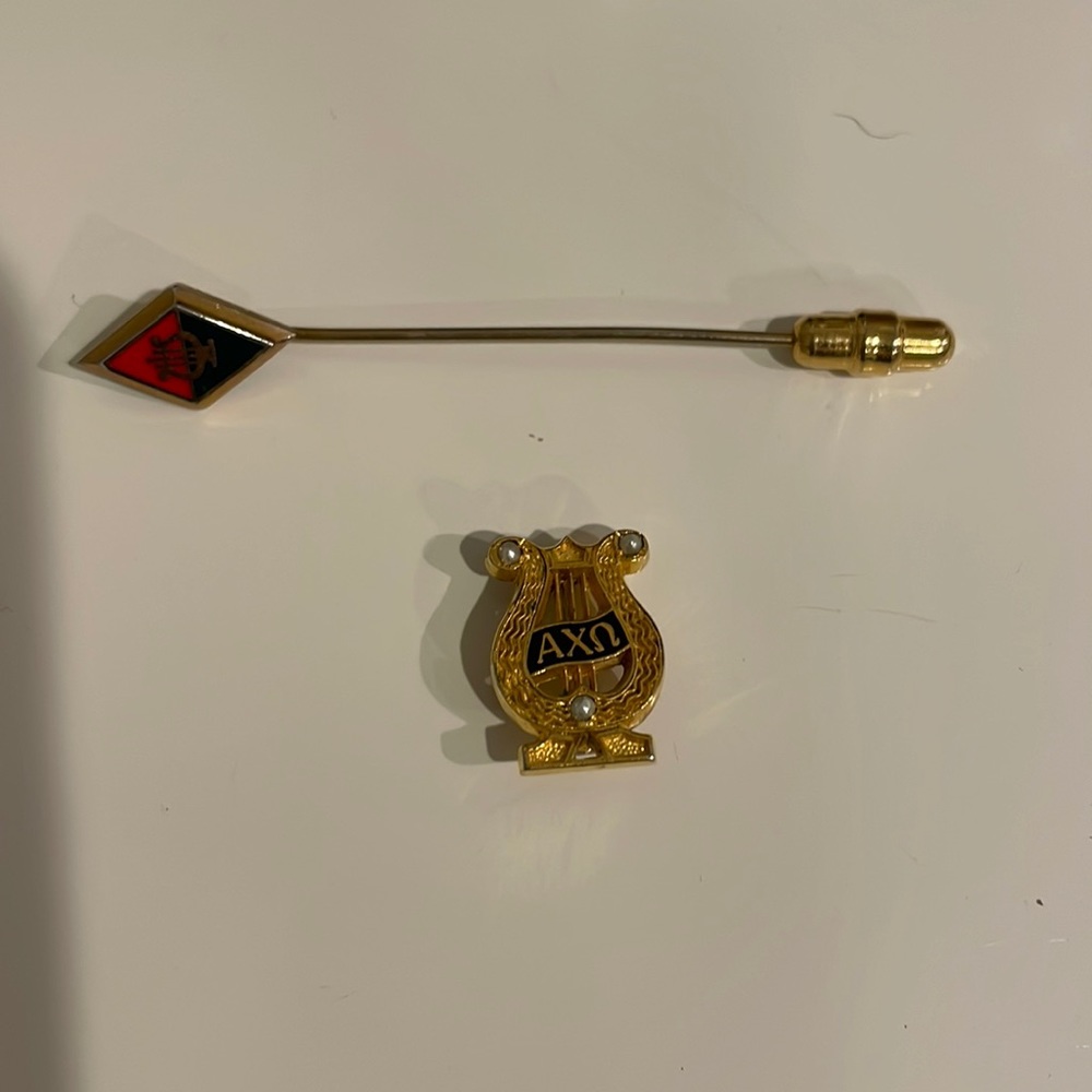 AXO stick pin and badge